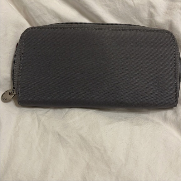 New Gray Women's Travelon Wallet Purple inside
Never Used Perfect Condition - Picture 2 of 8